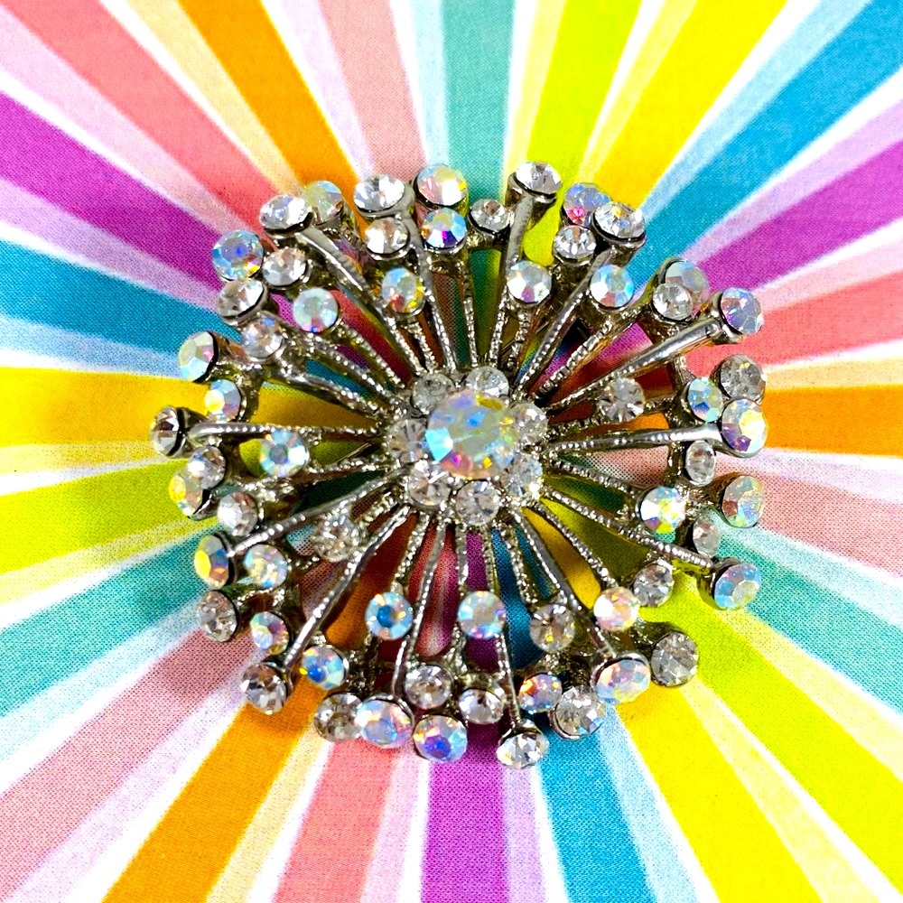 Stunning Aurora Borealis and silver tone starburst pin brooch
